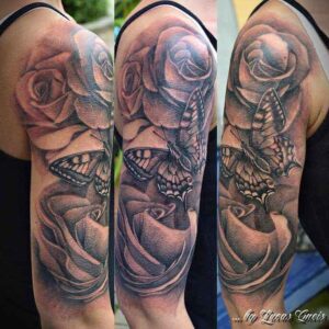 Schmetterling und Rosen Arm Tattoo